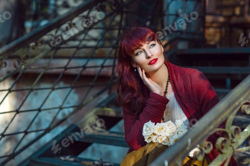 Preview: Girl sitting on old house stairs