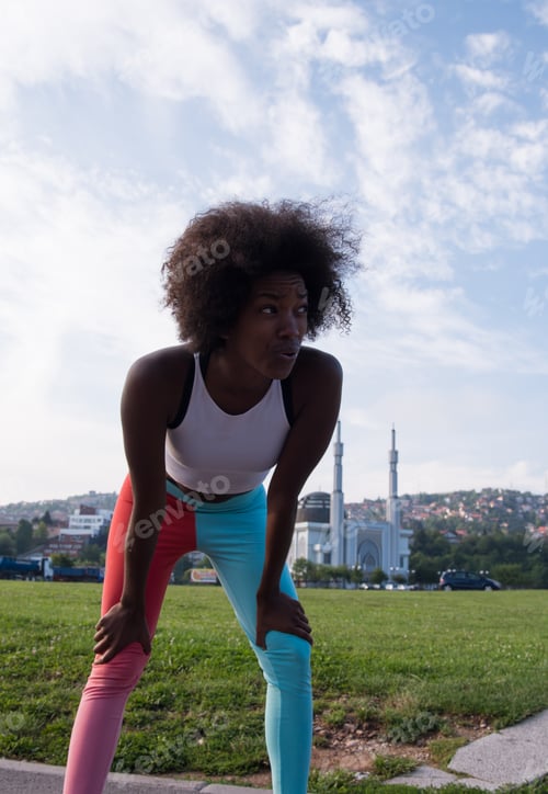 Preview: Portrait of sporty young african american woman running outdoors