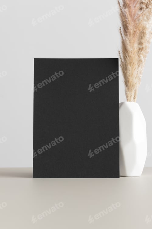 Preview: Black invitation card mockup with a pampas on the beige table. 5x7 ratio, similar to A6, A5.