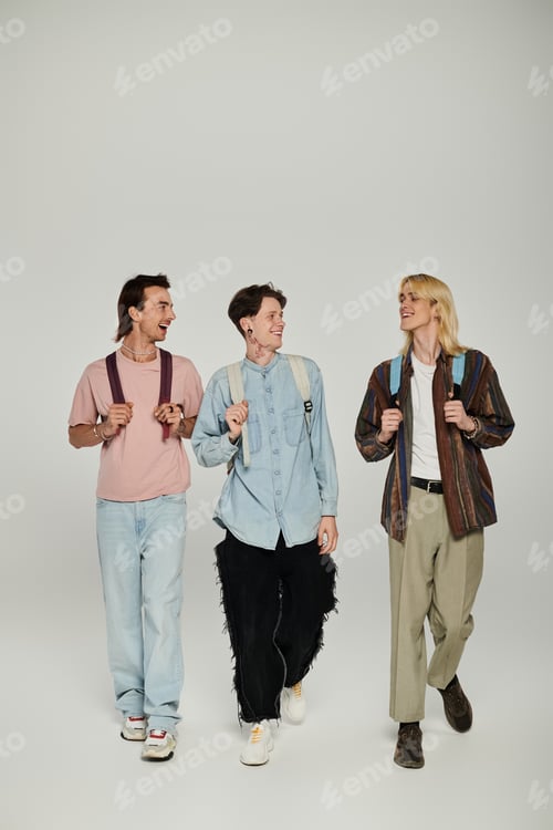 Preview: Three young students walking together