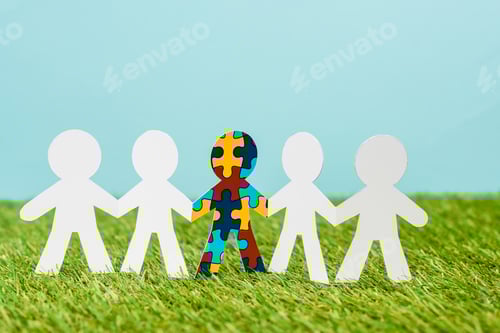 Preview: Special kid with autism among another on blue and green background