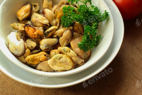 Preview: Mussels A Serving Of Seafood Is A White Plate. Food Background. Top Image