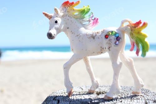Preview: A sparkly magical toy unicorn on the beach