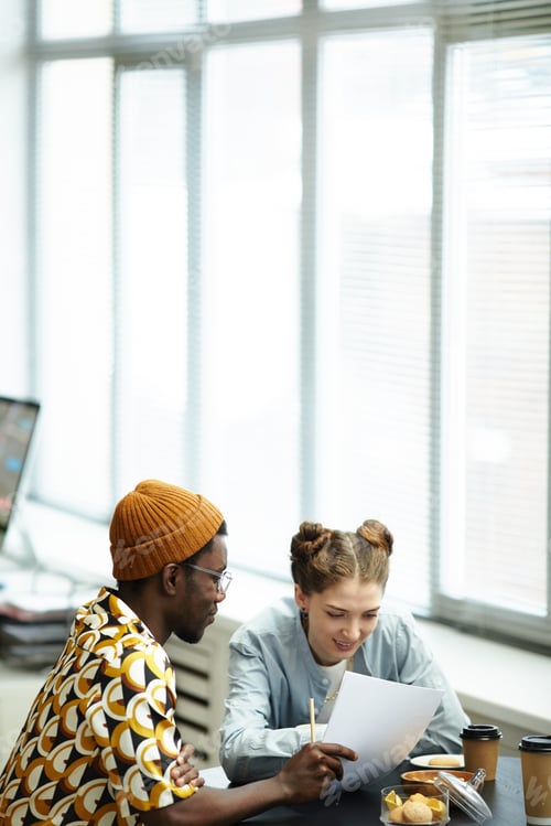 Preview: Two Young People in Office Minimal