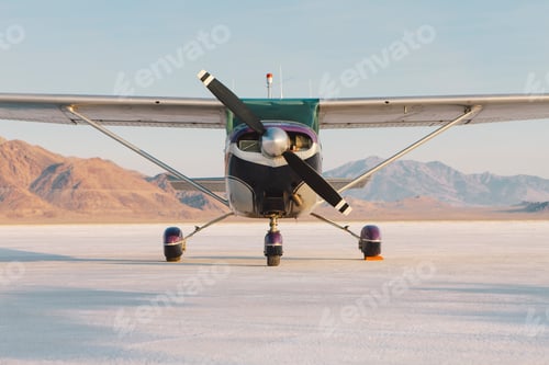 Preview: Small airplane parked on salt flats at Bonneville in Utah.