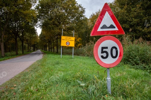 Preview: Warning signs on the side of the road in the Netherlands