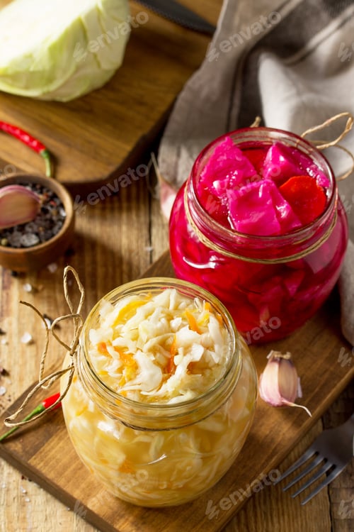 Preview: Homemade sauerkraut with carrot and salad cabbage with beetroot.