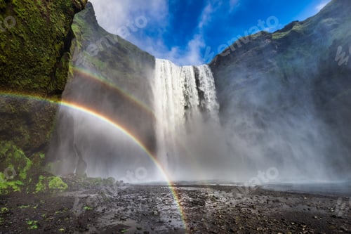 Preview: Beautiful waterfall Skogafoss in Iceland with rainbow