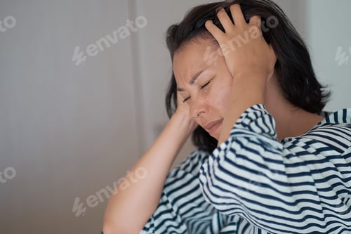 Preview: Woman having a headache. people, healthcare, stress and problem