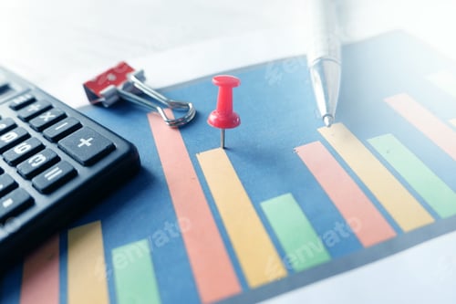Preview: financial graph, calculator and notepad on table