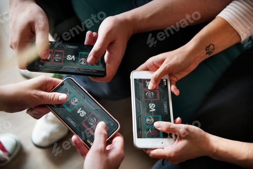 Preview: Group of diverse friends playing game on mobile phone