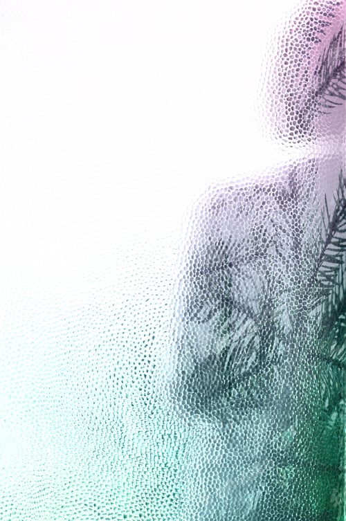 Preview: Young woman behind closed door seen through glass