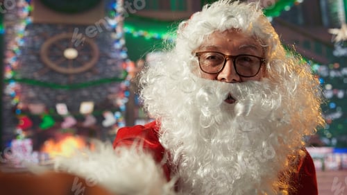 Preview: POV of Saint Nicholas old man waving at children on video conference