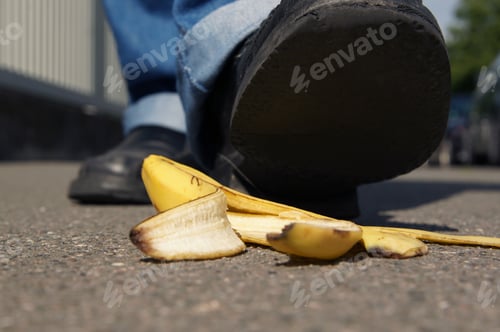 Preview: person about to step and slip on a banana peel or banana skin