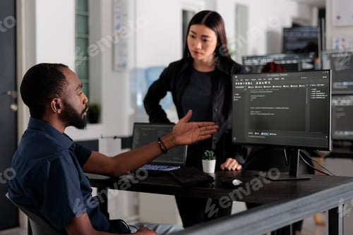 Preview: Diverse team of software developer developing html code and cloud computing