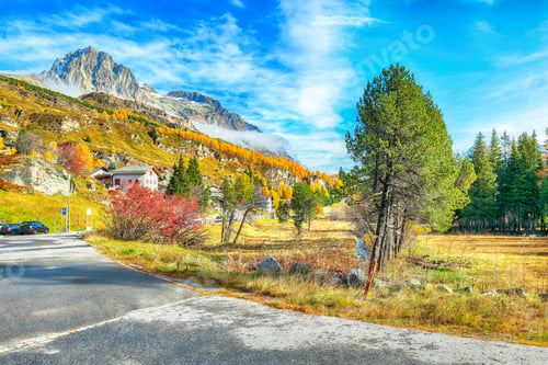 Preview: Awesome autumn scene near Maloja village overlooking mount Piz Materdell