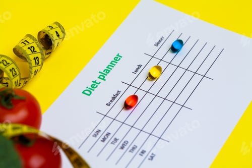 Preview: Diet plan for weight loss pills and fresh vegetables on a yellow background