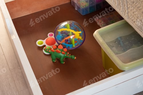Preview: Children's toy drawer with dinosaur, puzzle ball, and fidget spinner