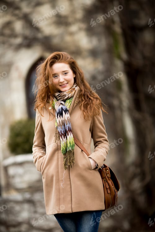 Preview: Young red hair woman at outdoors