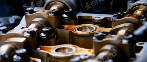Preview: Adjustment of the car's engine. Camshafts and valve in oil on the car engine.