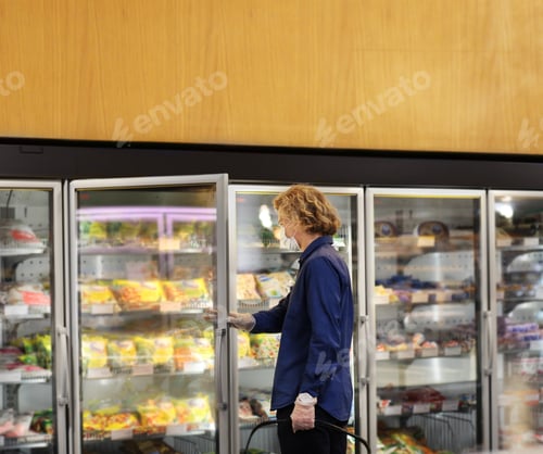 Preview: Supermarket Shopping, Face Mask And Gloves,Man Choosing Frozen Food From A Supermarket Freezer