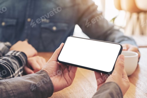 Preview: Woman using and looking at mockup mobile phone with friends in office