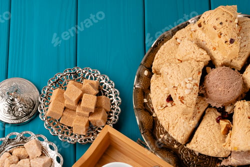 Preview: Turkish halva national dessert on blue wooden table