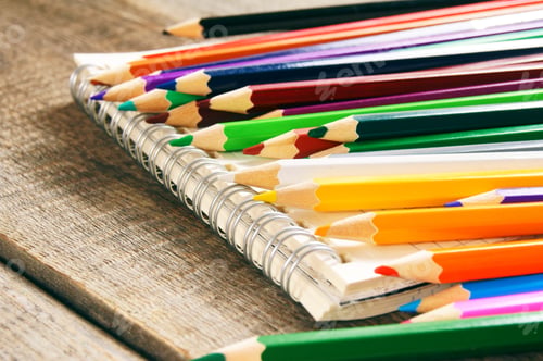 Preview: School tools. On wooden background.