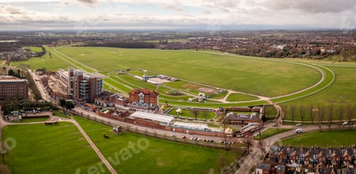 Preview: Aerial view above York Racecourse showing the whole circuit and buildings