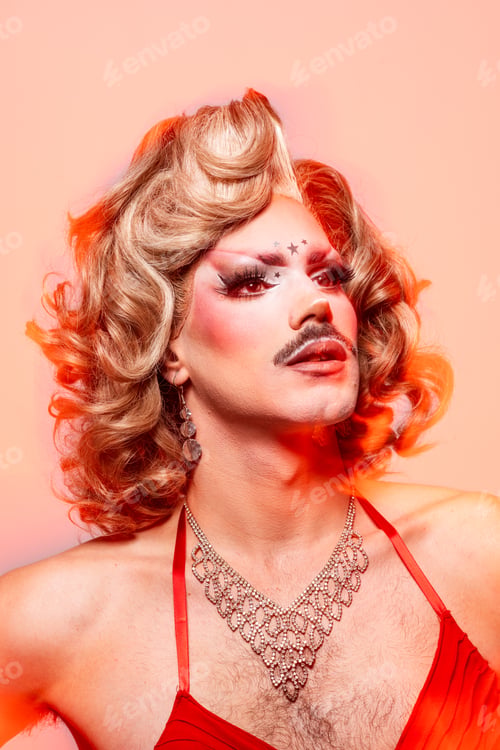 Preview: Vibrant Queer Expression With a Drag Performer Showcasing Bold Makeup and Elegant Attire