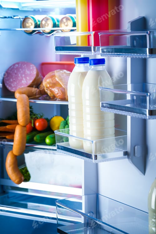 Preview: Open refrigerator filled with food