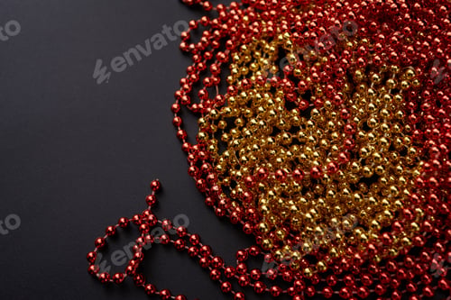 Preview: Pile Of Golden Beads Garland. Christmas Beads As A Background Or Texture. Christmas Garland Made