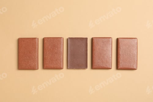 Preview: Brown chocolate bars on a light background