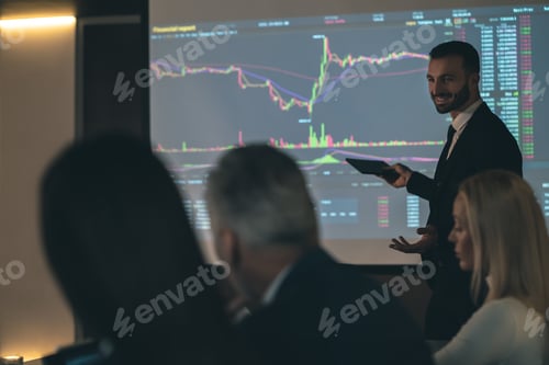 Preview: The man standing near the screen on the business meeting.