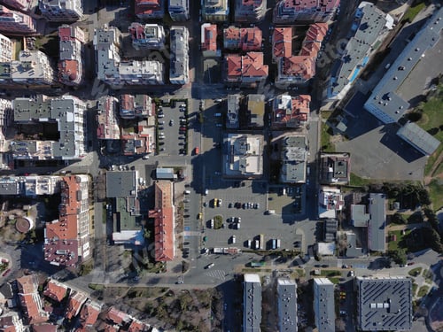 Preview: View from a height of the city of Pomorie with many cars, houses and hotels