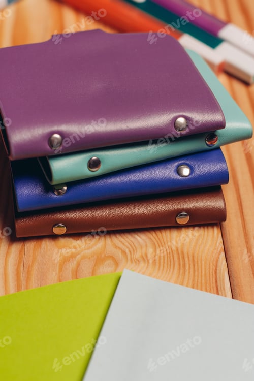 Preview: multicolored markers paper office school items wooden table