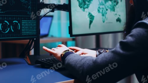 Preview: Close up of cyber criminal hands writing malware