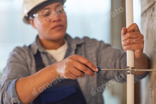 Preview: Female Plumber Working