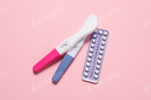 Preview: Blister of oral contraceptive pills and pregnancy tests on pink background, flat lay