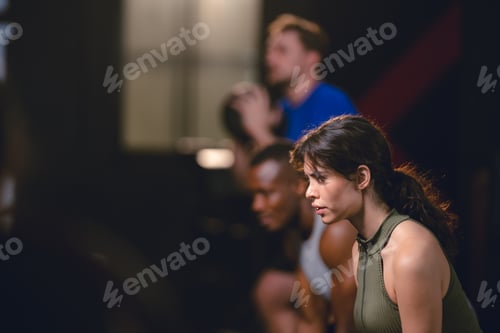 Preview: Personal trainer coach helping young woman exercising in the sport gym, exercise training workout