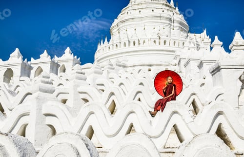 Preview: 55006,Asian woman sitting on temple walls, Mingun, Saigang, Myanmar