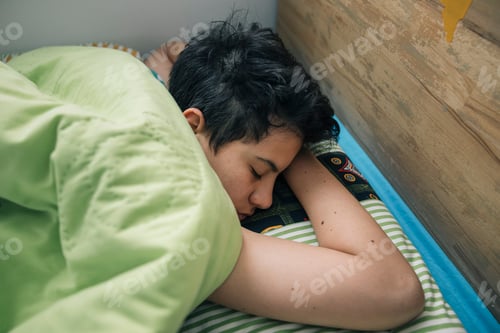 Preview: Teenager Girl Sleeping Peacefully in Bed, Enjoying Morning Routine