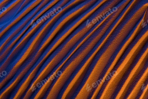 Preview: top view of abstract wavy background with sand and color filter