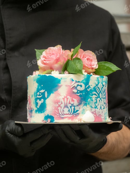 Preview: teal pink toned frosted cake with real roses topping for happy birth day party