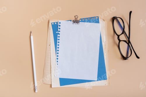 Preview: Blank sheet paper for note and pencil on colored background top view. Flat lay