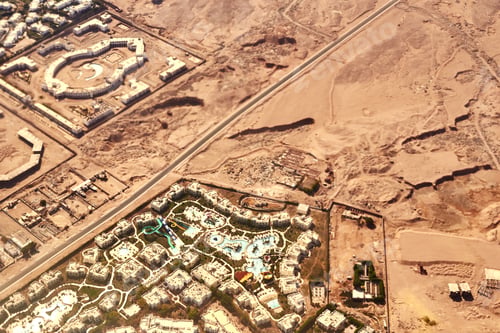 Preview: Aerial view of a city scape from airplane window