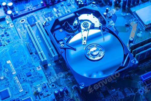 Preview: the macro view of thye hdd drive with information data, magnetic disc, electronic board background