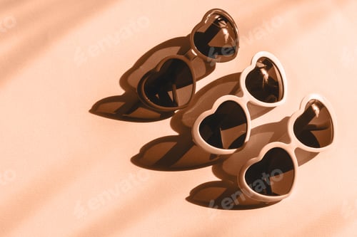 Preview: Heart sunglasses on bright light peach background