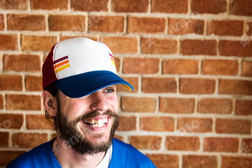 Preview: Portrait of Caucasian man wearing a cap