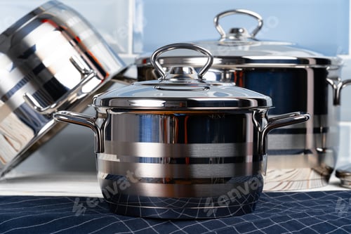 Preview: Close up photo of cookware set on kitchen counter
